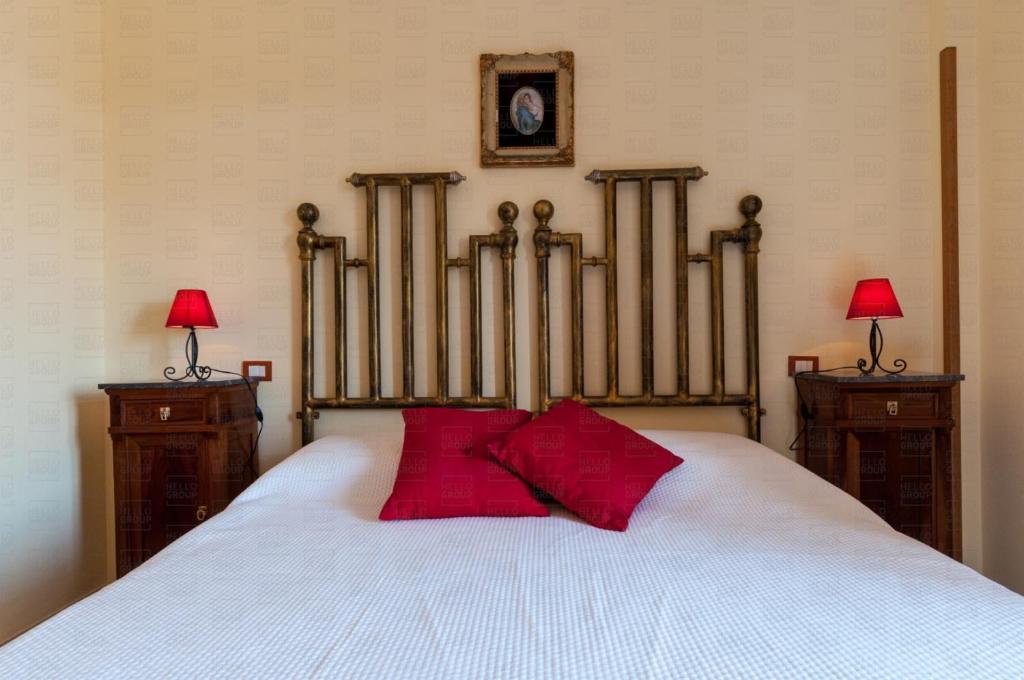 Łóżko lub łóżka w pokoju w obiekcie HelloApulia - Villa Flora