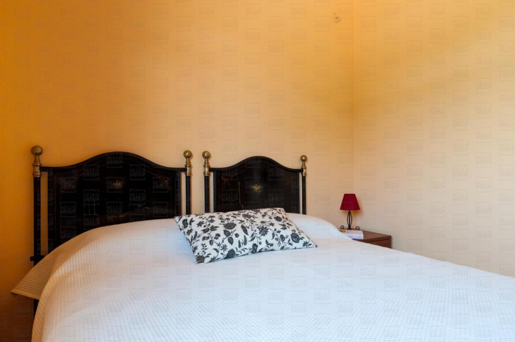 Łóżko lub łóżka w pokoju w obiekcie HelloApulia - Villa Flora