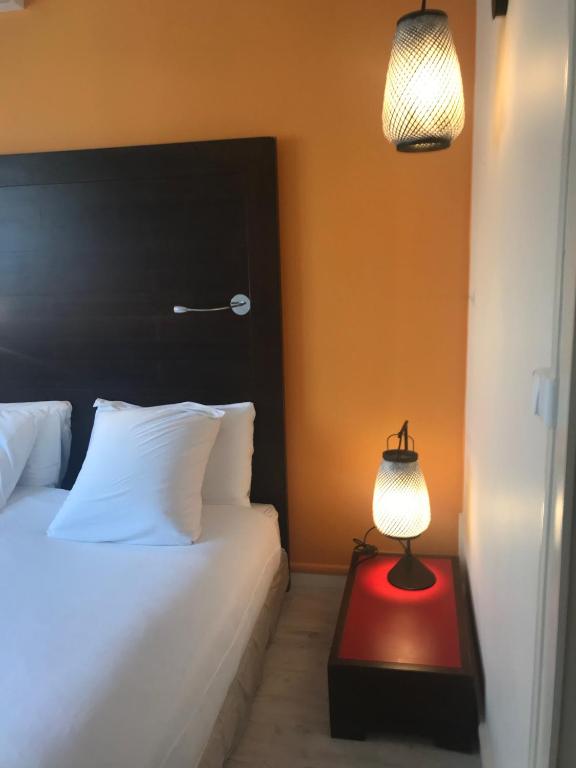 Postel nebo postele na pokoji v ubytování MOODz HOTEL VIENNE