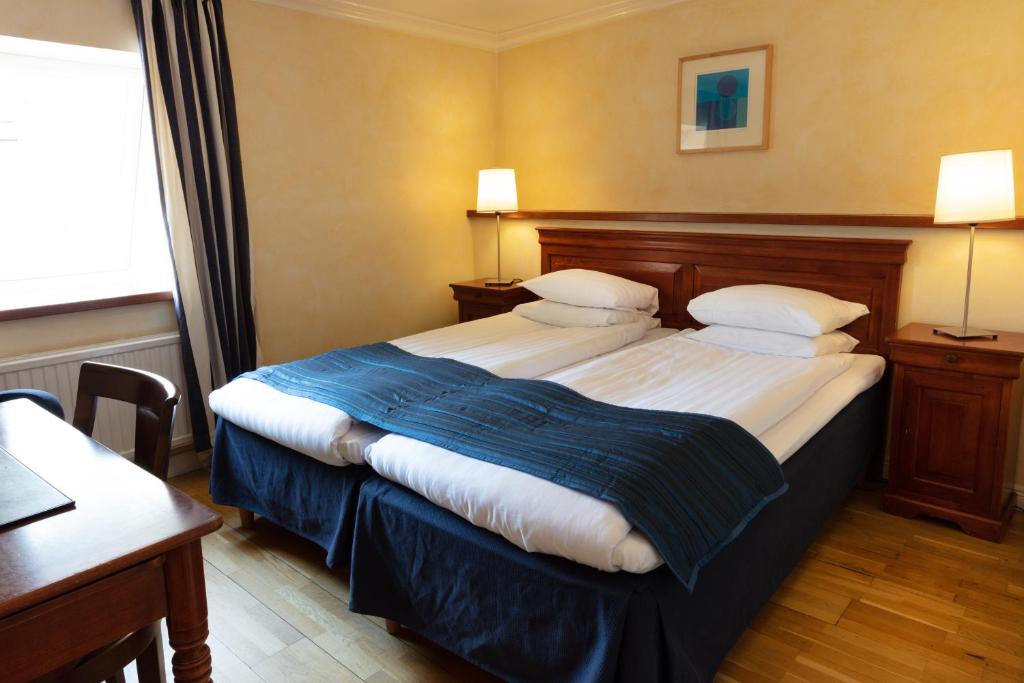 Postel nebo postele na pokoji v ubytování Center Hotel - Sure Hotel by Best Western