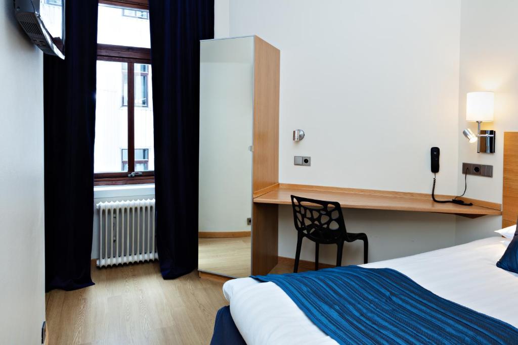 Postel nebo postele na pokoji v ubytování Center Hotel - Sure Hotel by Best Western