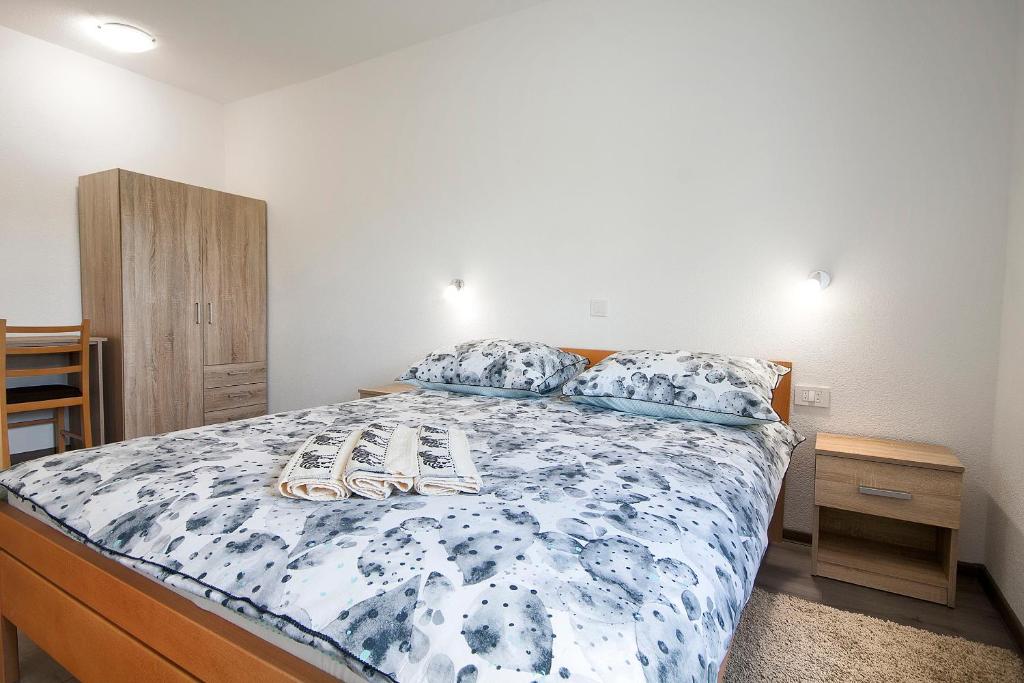 Postel nebo postele na pokoji v ubytování Apartments Matko