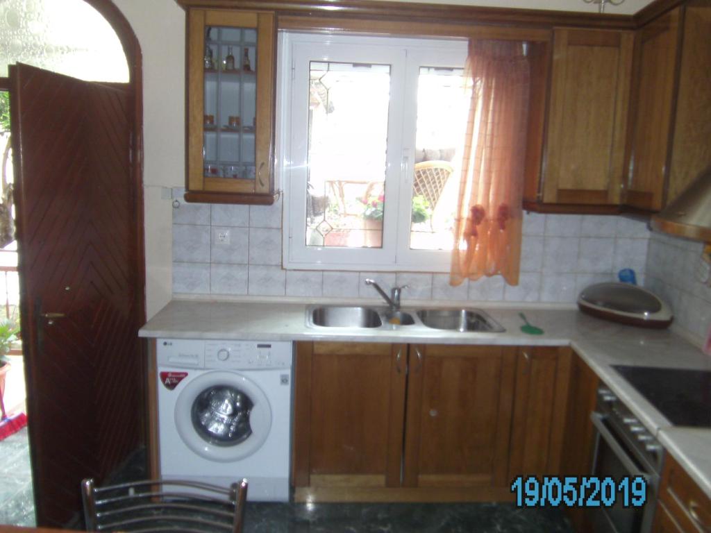 Kuchyň nebo kuchyňský kout v ubytování George's House