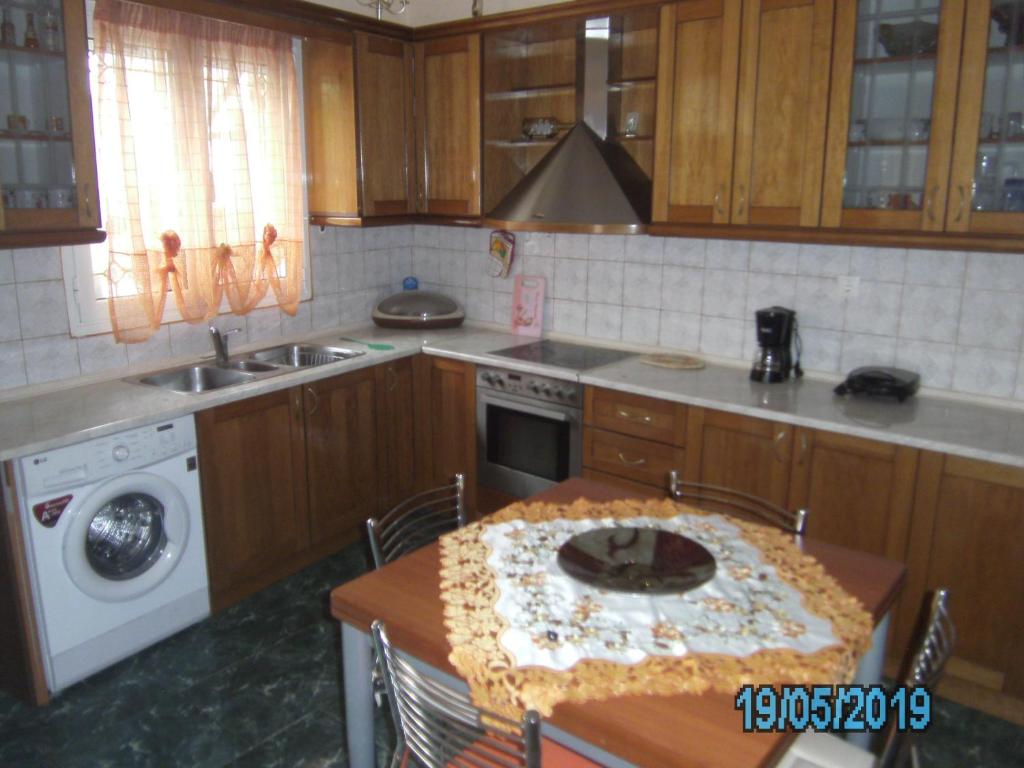 Kuchyň nebo kuchyňský kout v ubytování George's House