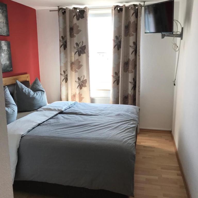 Postel nebo postele na pokoji v ubytování Hotel Maxdorfer Hof