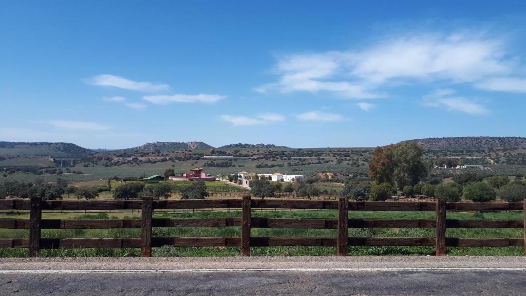 a fence on the side of a road at VILLA MARIA in Vilches