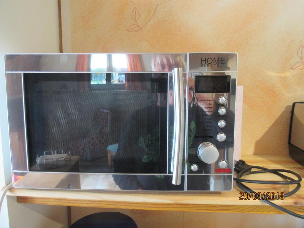 TV a/nebo společenská místnost v ubytování La Muria Apartment