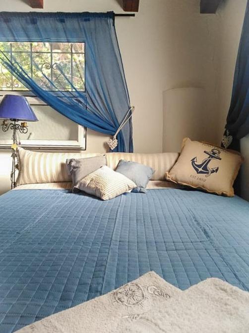 Postel nebo postele na pokoji v ubytování Sevi Platamon Home