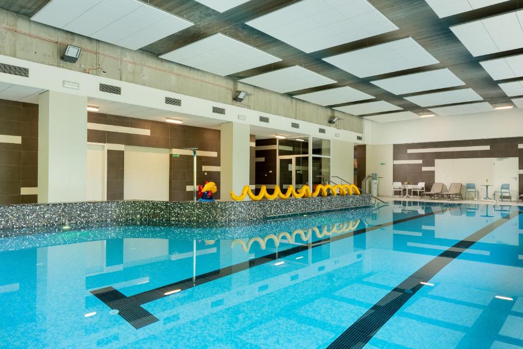 Bazén v ubytování Aquamarina Onyx Marina Invest nebo v jeho okolí