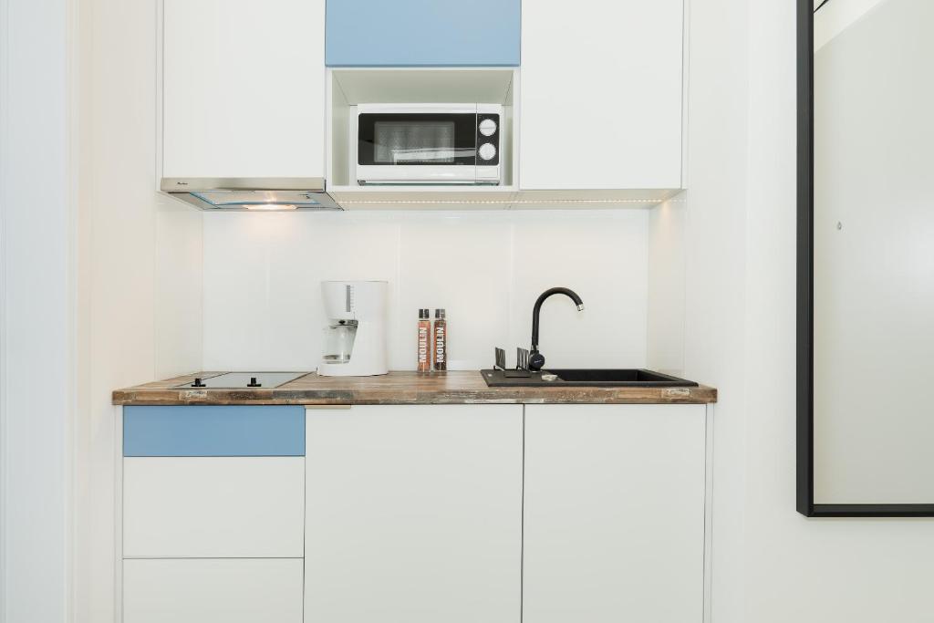 Küche&#47;Küchenzeile in der Unterkunft Aquamarina Onyx Marina Invest