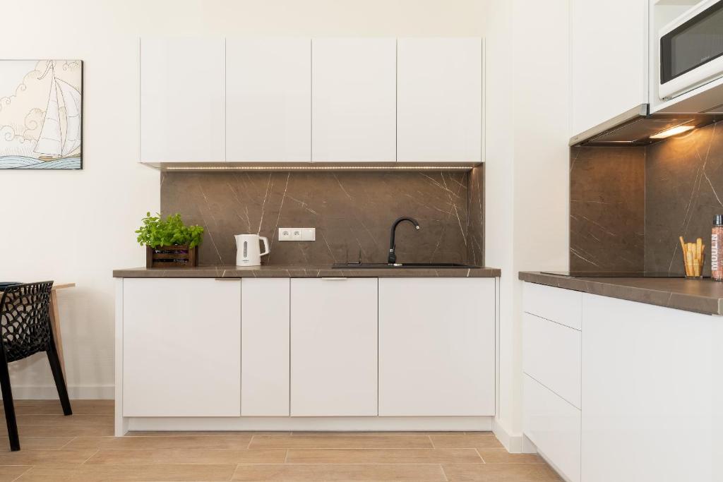 Küche&#47;Küchenzeile in der Unterkunft Aquamarina Onyx Marina Invest