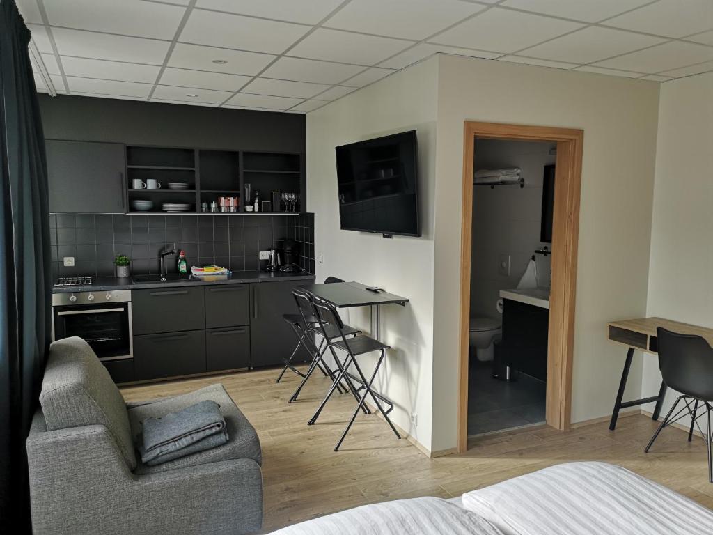 Una cocina o kitchenette en Centrum Hotel