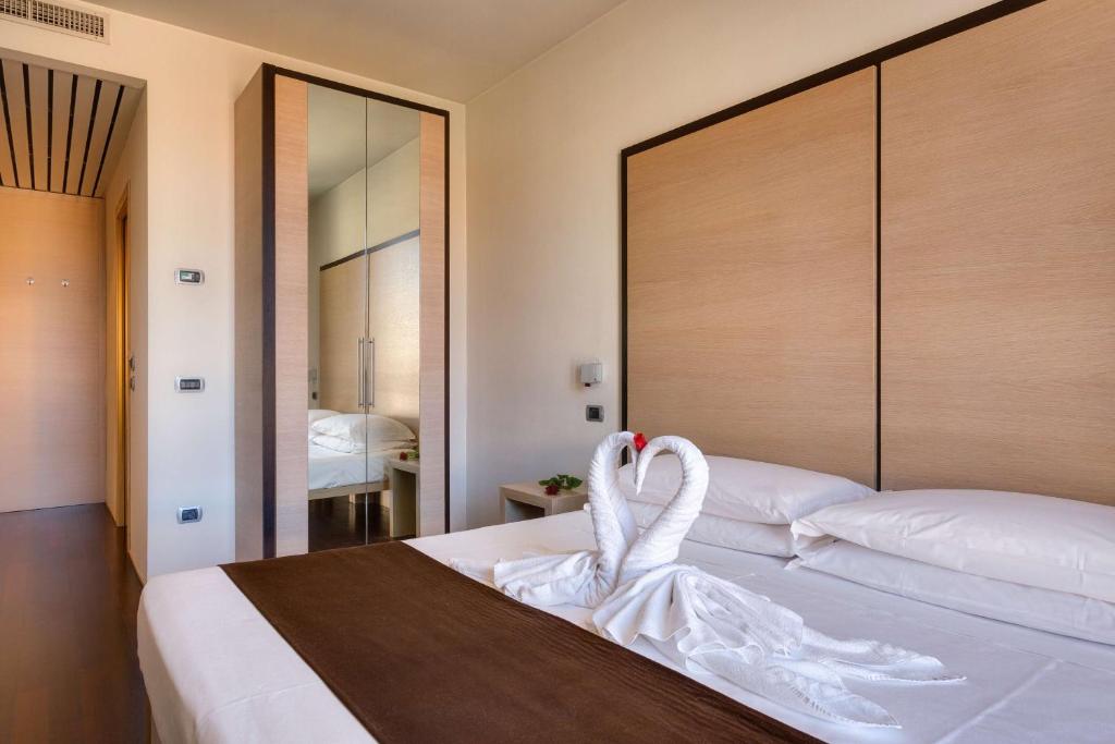 Posteľ alebo postele v izbe v ubytovaní Best Western Hotel San Marco