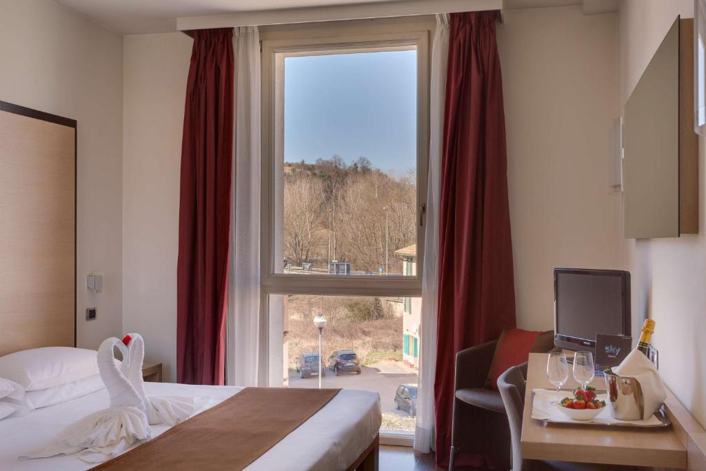 Posteľ alebo postele v izbe v ubytovaní Best Western Hotel San Marco