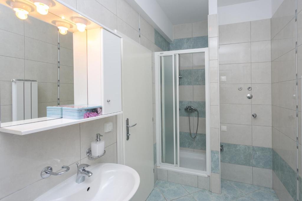 Kúpeľňa v ubytovaní Apartments Stipisic