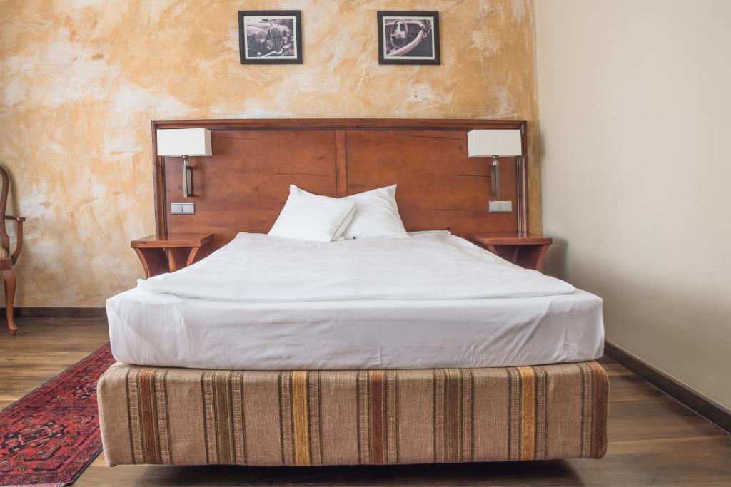 Postel nebo postele na pokoji v ubytování Hotel Rejs