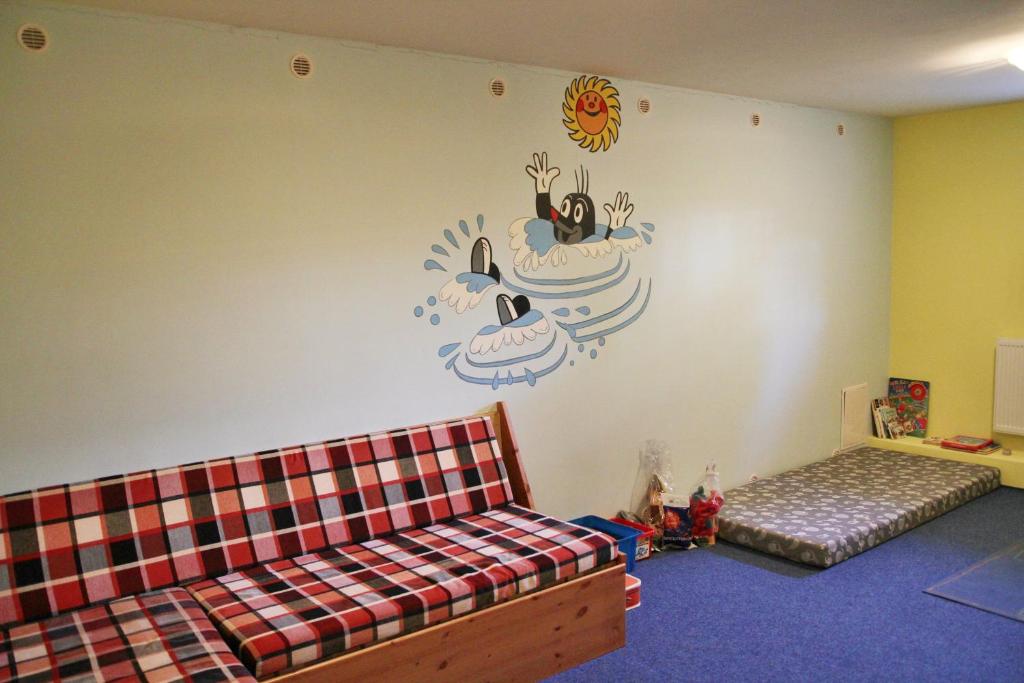 Postel nebo postele na pokoji v ubytování Schneeberg Apartmany