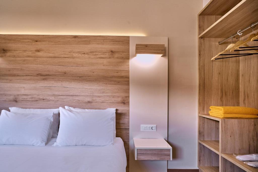 Posteľ alebo postele v izbe v ubytovaní Emmanouela's Apts