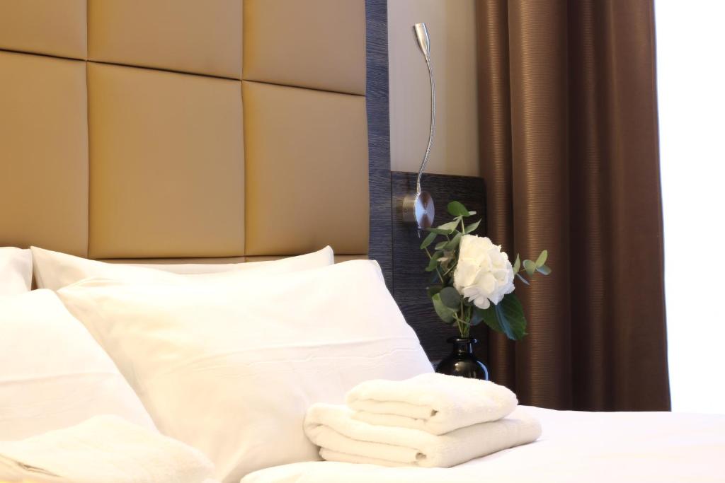 Postel nebo postele na pokoji v ubytování Hotel Delta am Potsdamer Platz
