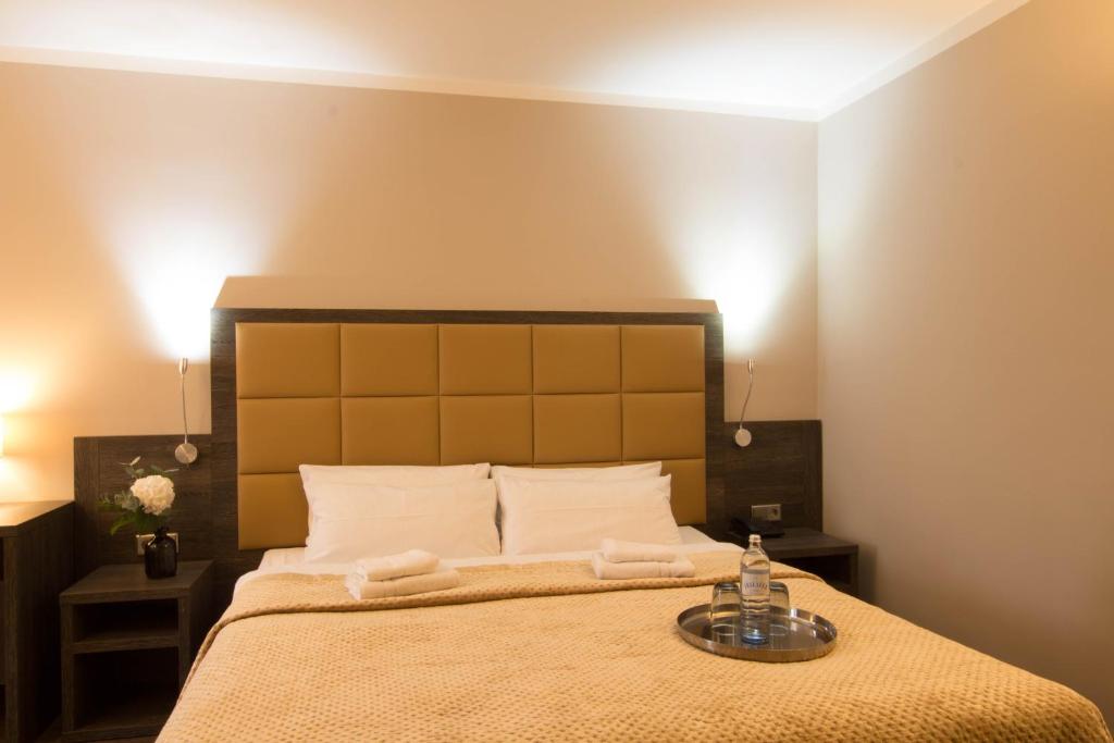 Postel nebo postele na pokoji v ubytování Hotel Delta am Potsdamer Platz