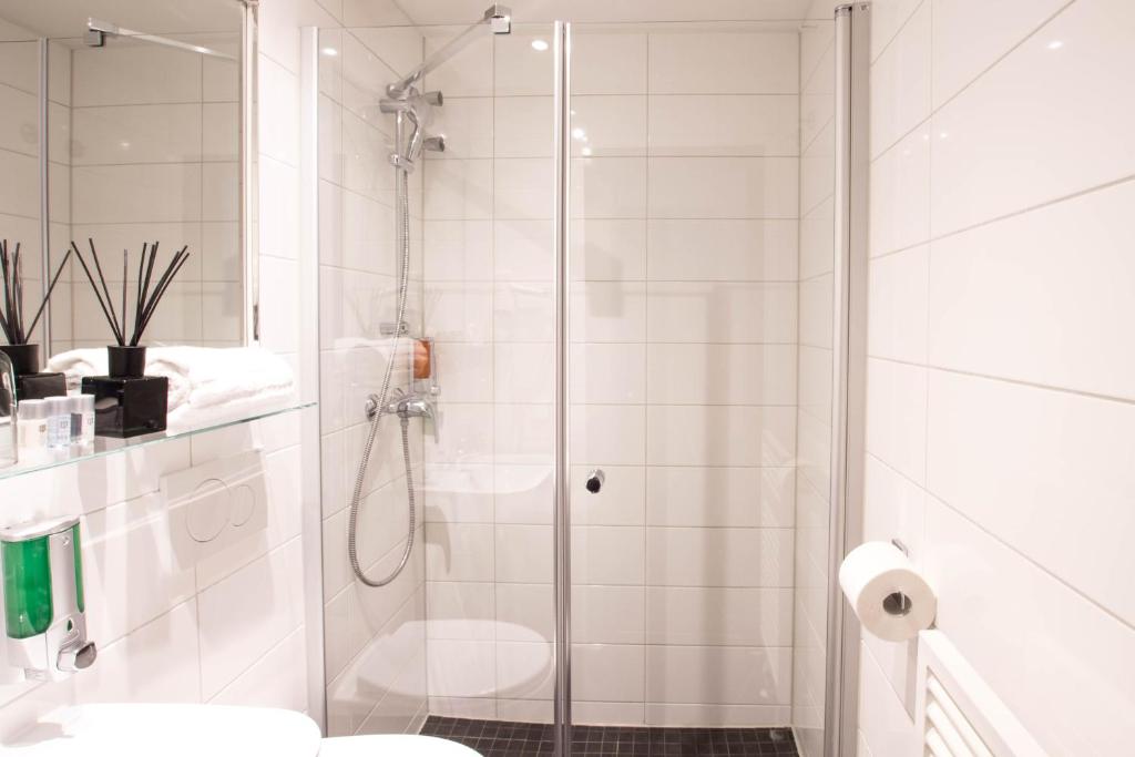 Koupelna v ubytování Hotel Delta am Potsdamer Platz