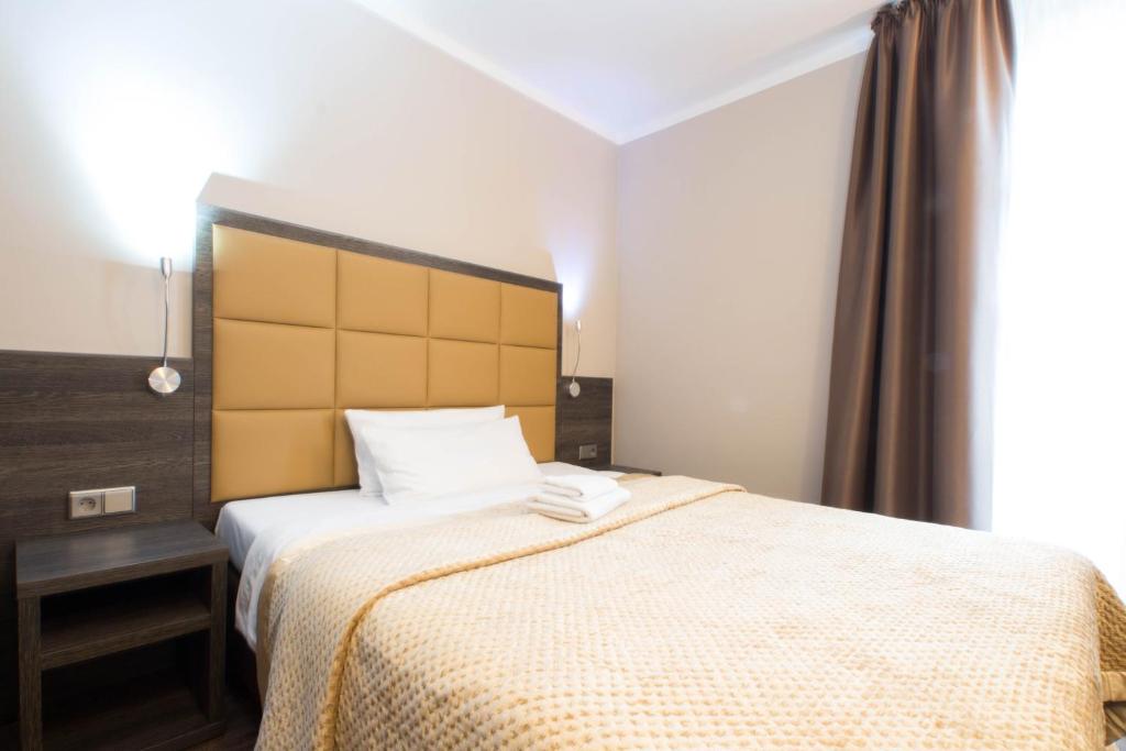 Postel nebo postele na pokoji v ubytování Hotel Delta am Potsdamer Platz