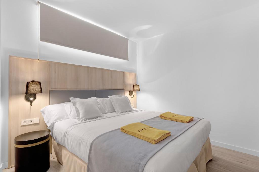 Postel nebo postele na pokoji v ubytování Palmanova Suites by TRH