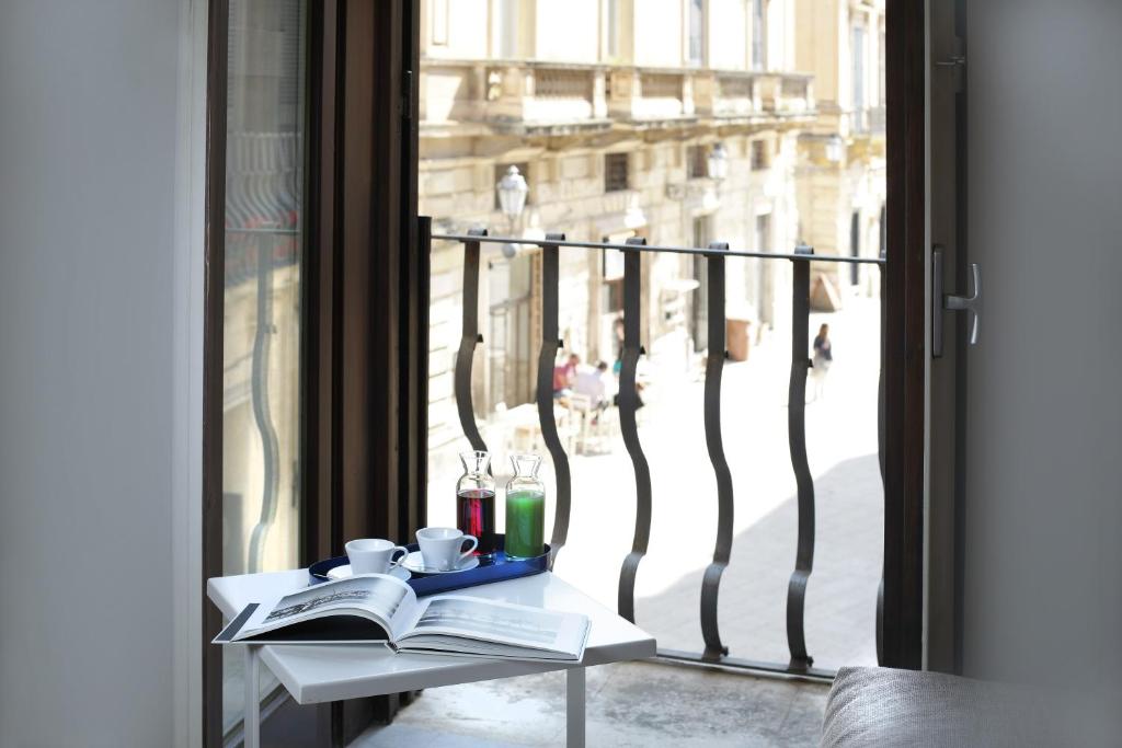 Balkón nebo terasa v ubytování Santacroce Luxury Rooms