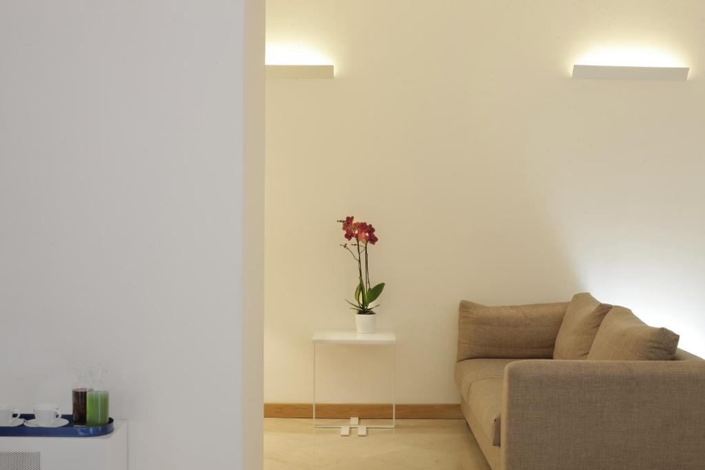 Posezení v ubytování Santacroce Luxury Rooms