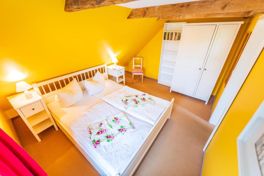 Postel nebo postele na pokoji v ubytování Vogelhaus Gobbin
