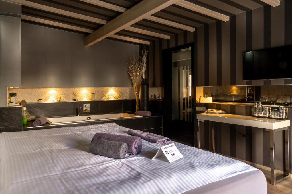 Postel nebo postele na pokoji v ubytování SL'otel - Das StadtHotel - voll Klimatisiert