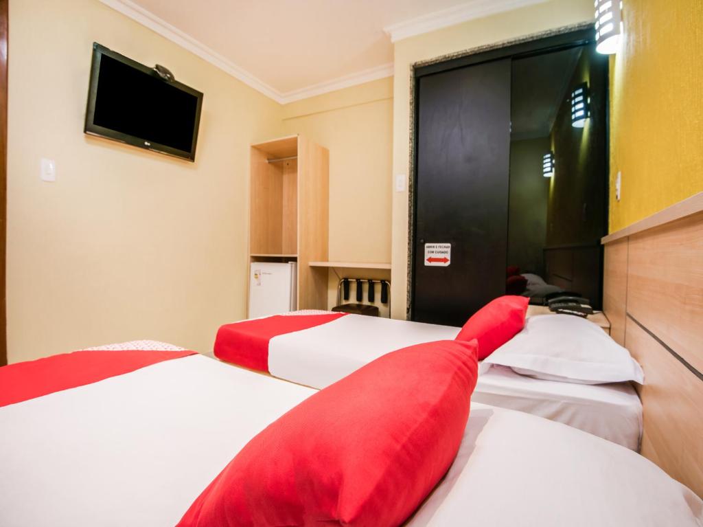 Cama o camas de una habitación en Hotel Villa Rica