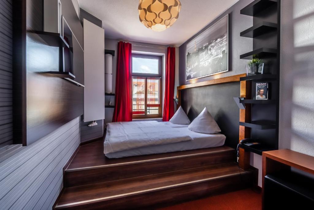 Postel nebo postele na pokoji v ubytování SL'otel - Das StadtHotel - voll Klimatisiert