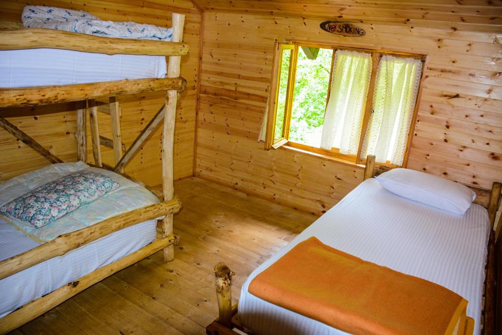 Letto o letti in una camera di Eagles Land