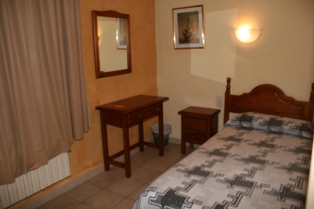 Postel nebo postele na pokoji v ubytování Hotel Sucara
