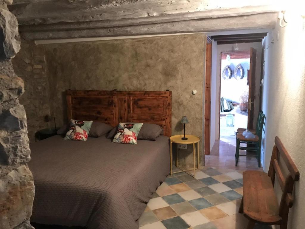 Postel nebo postele na pokoji v ubytování Apartamento El Fenal de Turmo Casa rural "El Capricho de Nieves"