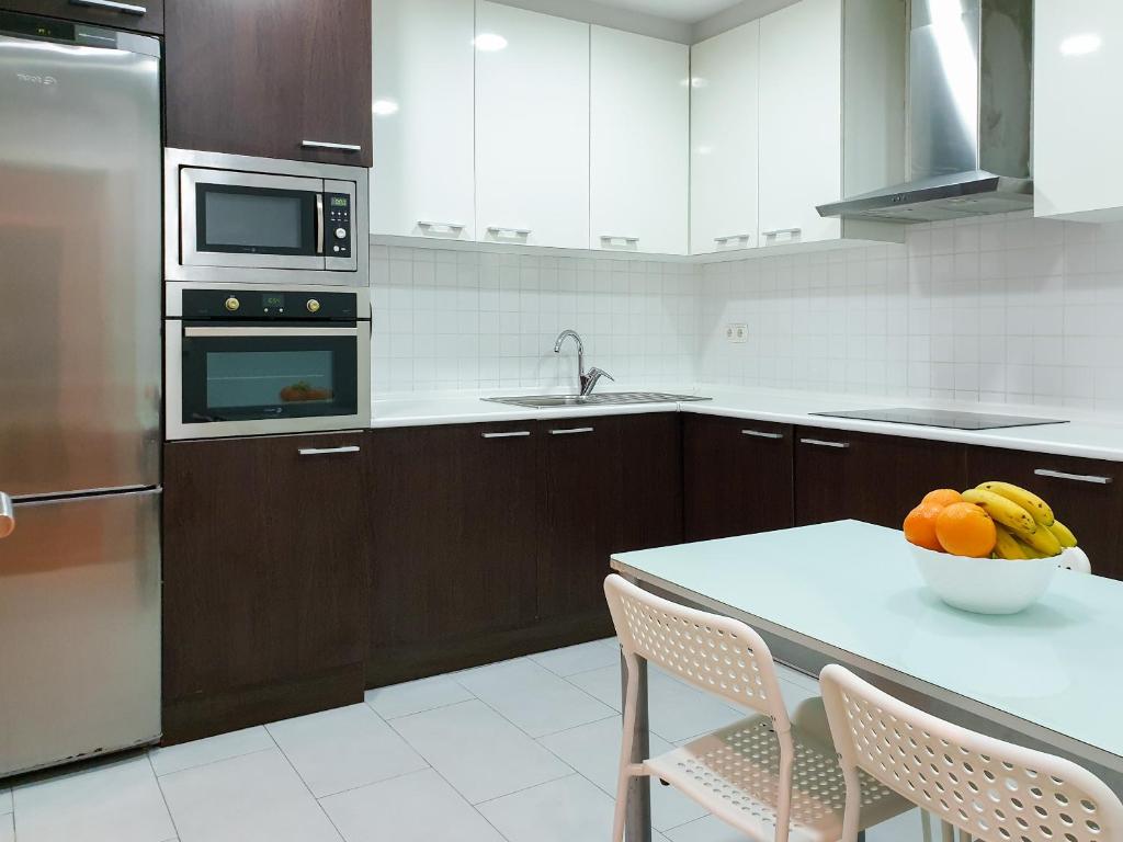 A kitchen or kitchenette at Sausalito - Iberorent Apartments