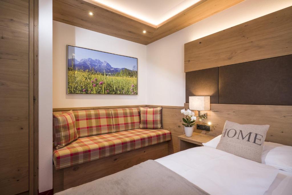 Postel nebo postele na pokoji v ubytování Hotel Andreas Hofer