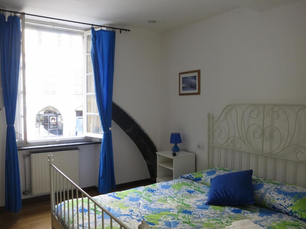 Postel nebo postele na pokoji v ubytování B&B Archi di Borgolungo