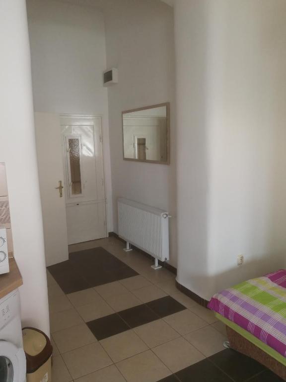 Posteľ alebo postele v izbe v ubytovaní Next door Apartment
