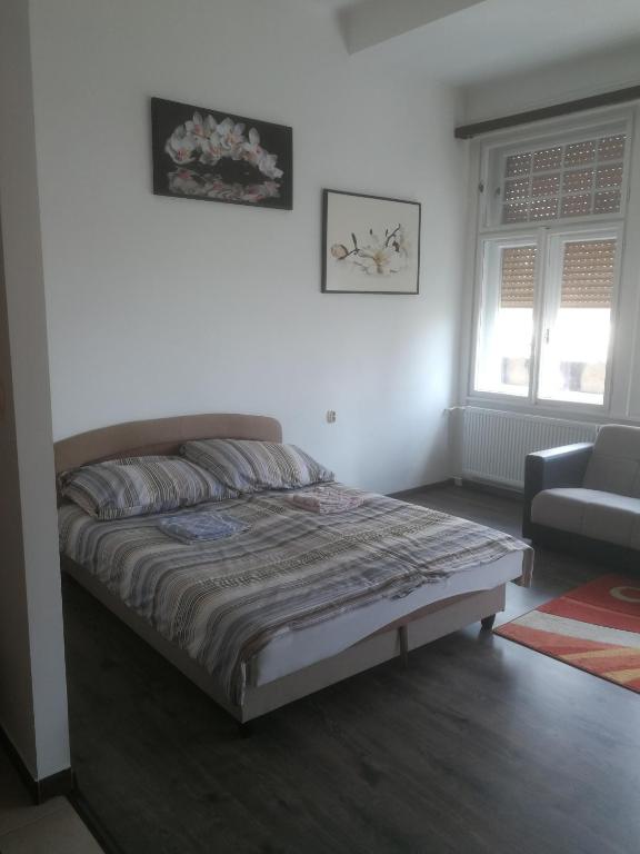 Posteľ alebo postele v izbe v ubytovaní Next door Apartment