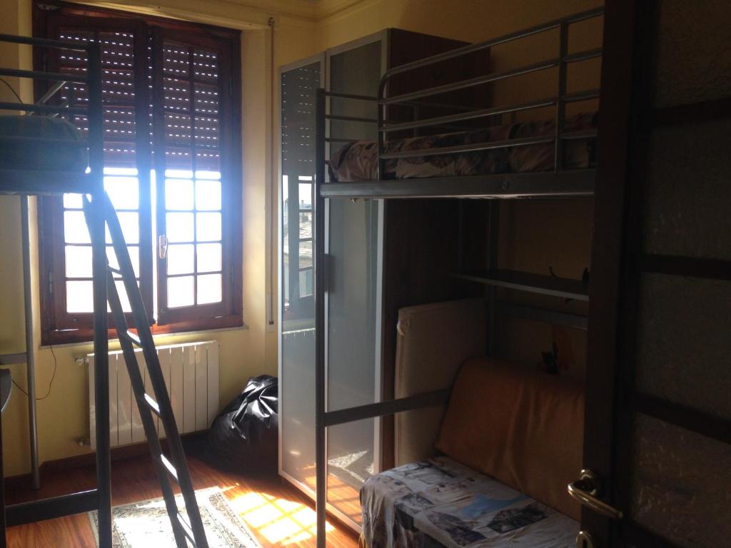 
A bunk bed or bunk beds in a room at Attico vista mare
