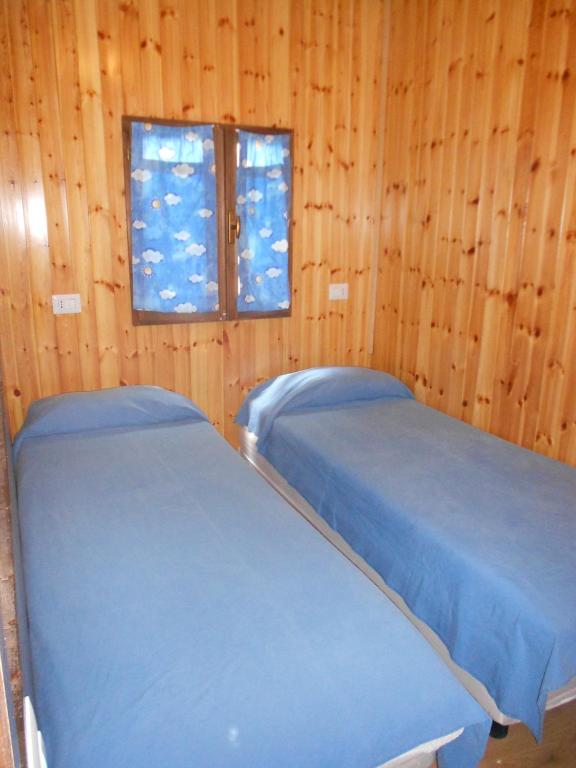 Postel nebo postele na pokoji v ubytování Il Rospo