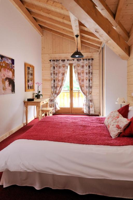 Una cama o camas en una habitaci&oacute;n de Savoy Morzine