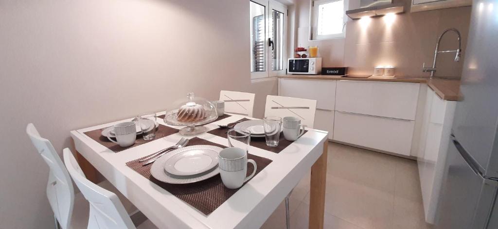 Kuchyň nebo kuchyňský kout v ubytování Guesthouse Čivljak