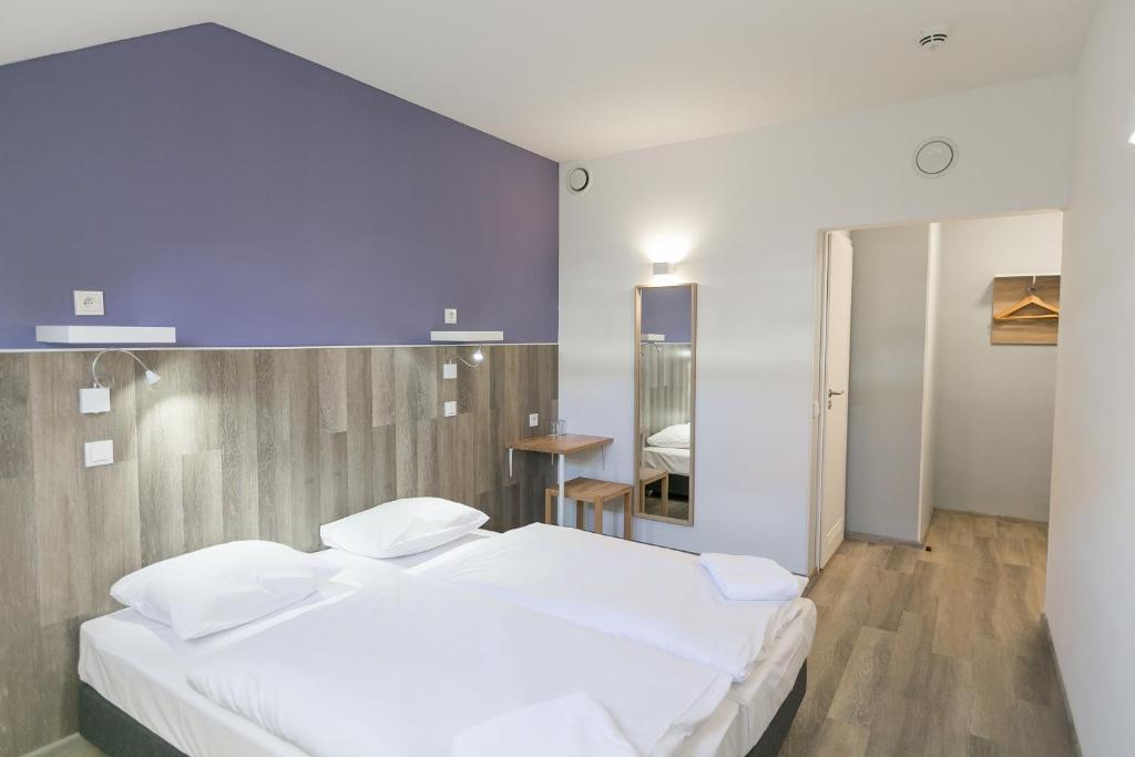 Postel nebo postele na pokoji v ubytování Prague Dream Hostel