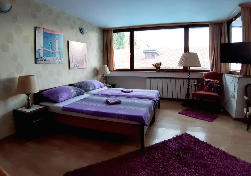 Postel nebo postele na pokoji v ubytování Hostel Pansion Lion
