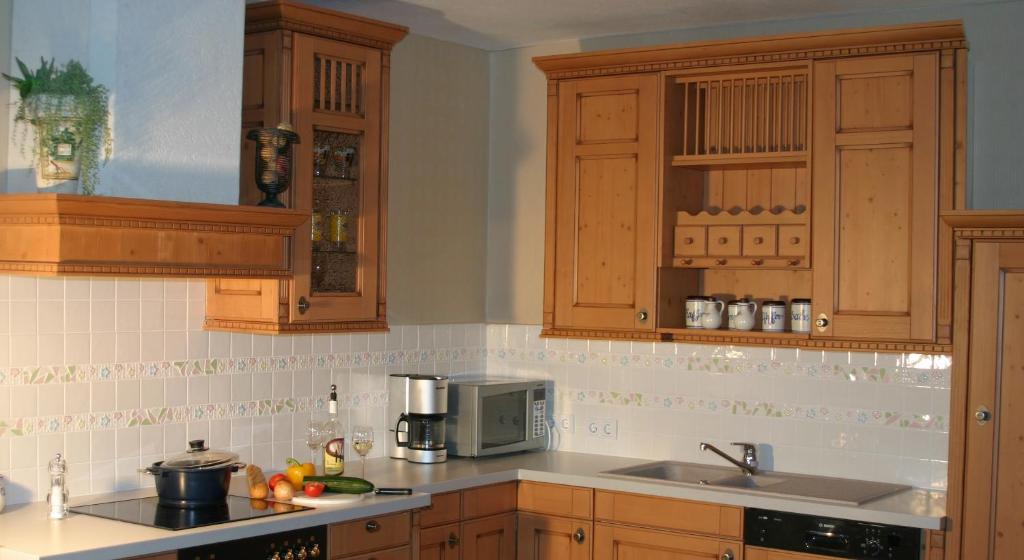 Kuchyň nebo kuchyňský kout v ubytování Appartementhaus Das Mittelpunkt