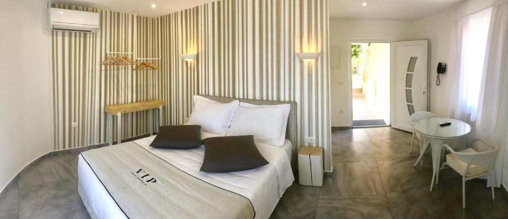 Postel nebo postele na pokoji v ubytování Apartments VIP Residence
