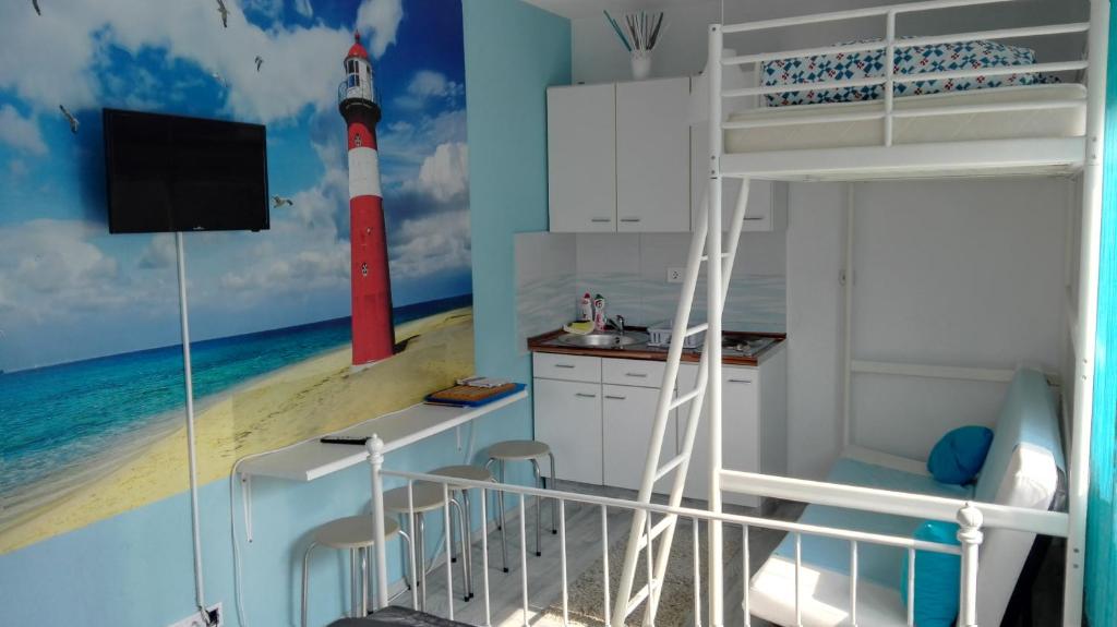 Kuchyňa alebo kuchynka v ubytovaní Sunshine apartman